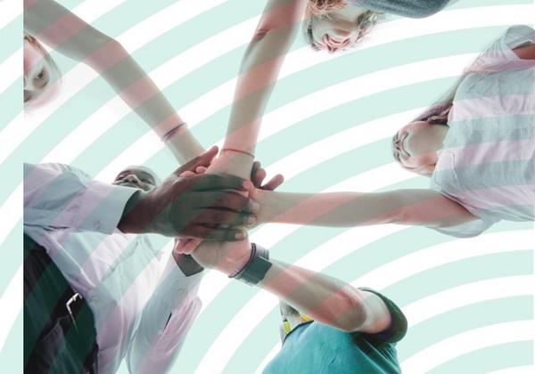 group of students holding hands