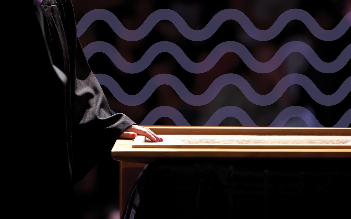 Student's hand placed on a wooden box